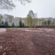 Van Weert verricht terreinwerk voor hovenier bij tuinrenovatie in Esch